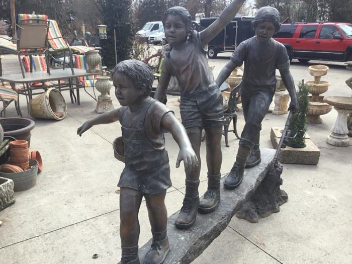Whimsical bronze children’s themed statues