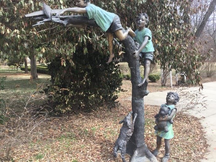 Whimsical bronze children’s themed statues