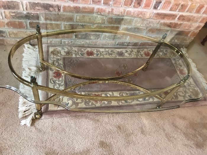 Glass and brass coffee table