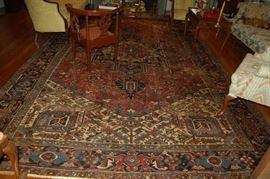 Rug is 9' 10 inches x 15' 4 inches