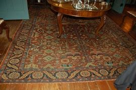 Rug is 9' 4 inches by 11' 8 inches