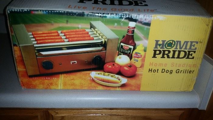 Multiple different hot dog cookers still in boxes