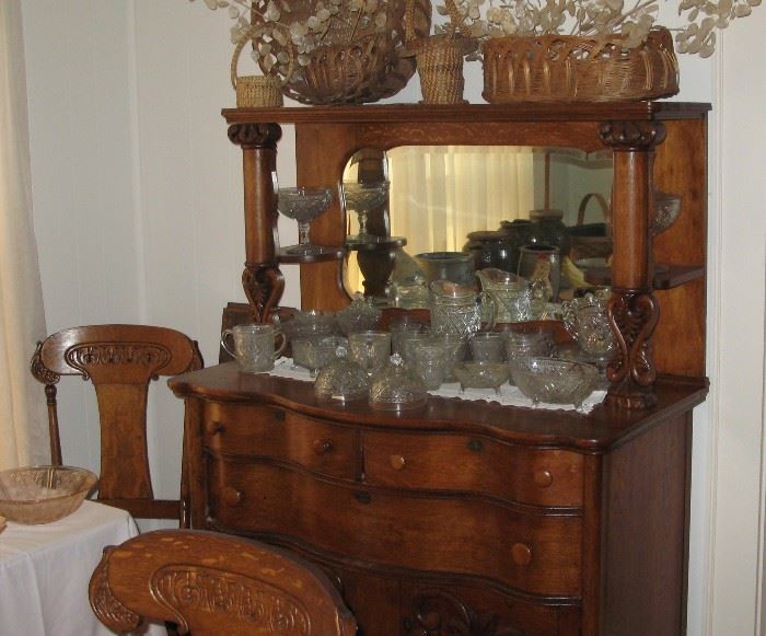 Oak sideboard, showing the collection of pressed glass