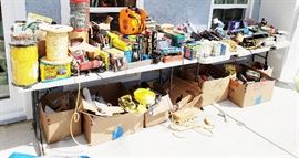 more tools overflowing onto the back.yard