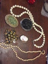 Real pearls & large statement brooches-nice cameo