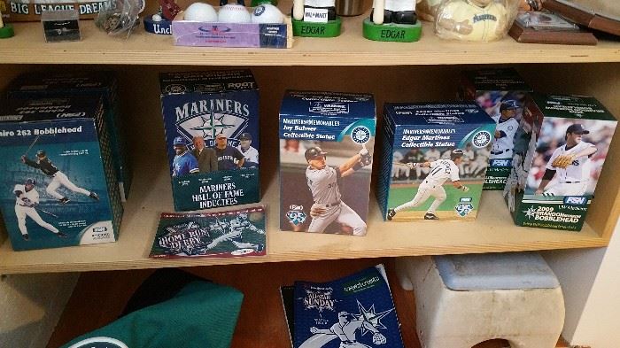 Nice group of Mariners collectibles - bobbleheads, statues, signed baseballs, team signed cap from spring training.  sorry, i am missing a couple of photos - i will post more tomorrow!