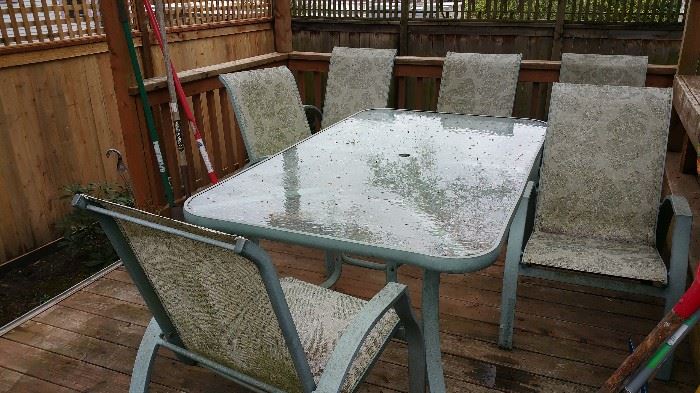 patio set with SIX chairs - needs a good cleaning