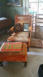 orange is the new black!  seriously, it is the new decorating sensation, goes with everything....  vintage arm chair and matching ottoman - napkin set - area rug