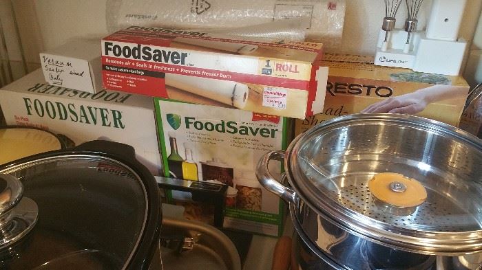 LOTS of food saver bags and cannisters