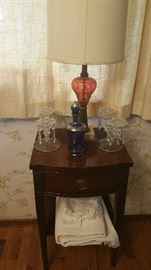 nice mahogany side stand...vintage candelabra....cobalt and silver overlay decanter....fired on cranberry over crystal lamp