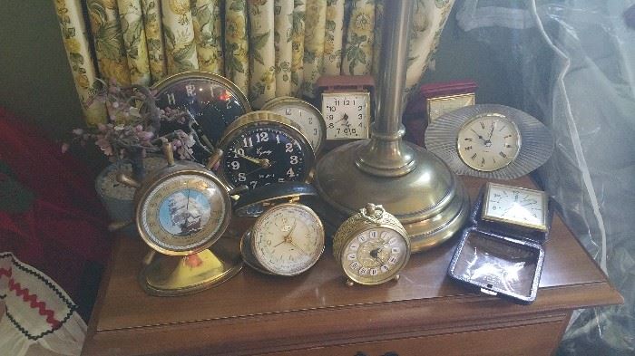 collection of bedside clocks, alarm clocks