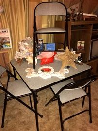 Vintage card table and chairs and a fun variety of seashells 