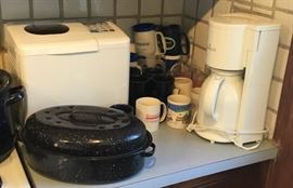 Kitchen items, roasting pans, coffee pot, bread maker
