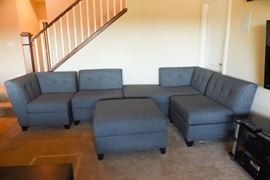 Seven Piece Versatile Grey Fabric Sectional Couch
