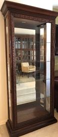 Lighted Curio Cabinet w Carved Wood Frame, and Side Openings