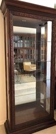 Lighted Curio Cabinet w Carved Wood Frame, and Side Openings