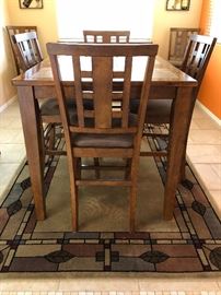 Ashley Dining Table: Pub Style, Tile Inset Top w 6 each 24" Bar Stools
Ashley Buffet
Area Rug