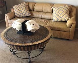 Leather Sofa, Sculptures, Tiled Drum Table