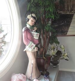 Tall statue. Guesstimated to be over 2' tall. Is antique according to the owner, but has yet to be validated.