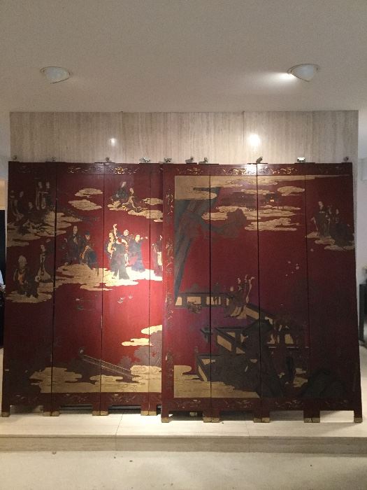 2 elaborate Asian 4 panel enamel screens in a beautiful red color with carved detail.  Design fits together with both screens, so this could be a long 8 panel screen.
