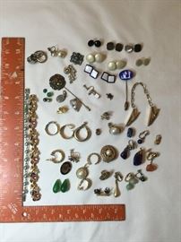 Assortment of costume jewelry and pieces including several sets of ladies cufflinks and two bracelets