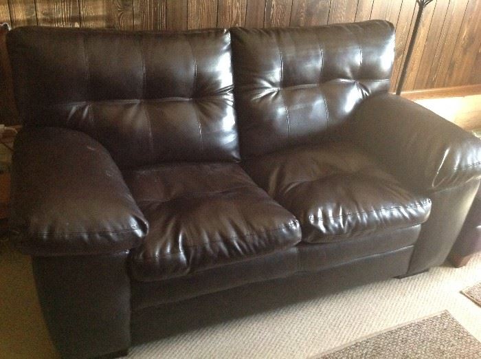 Leather Style Loveseat $ 260.00