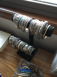 Mostly sterling silver bracelets in this photo