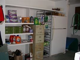 More cleaning supplies, file cabinet, refrigerator, Elfa shelves