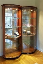 Pair of lighted curio cabinets