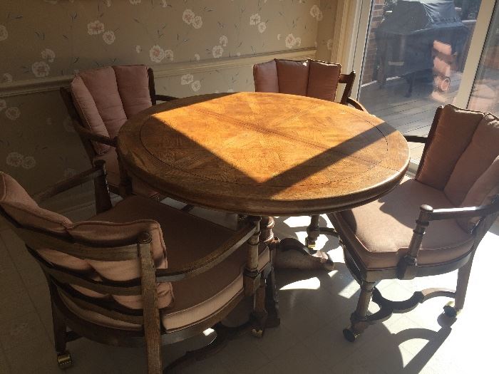 Game table / kitchen table (48" round - plus has 2 leaves for dining table) with 6 club chairs on casters available