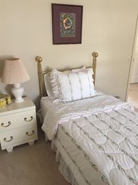 Twin brass bed, mattress set, and mid-century nightstand