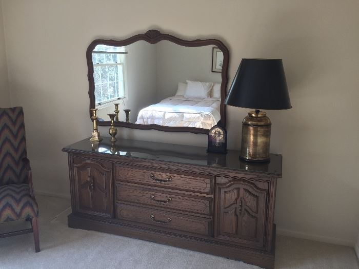 Dresser with antique mirror, brass lamp