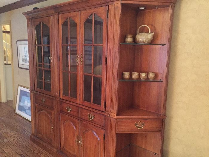 Thomasville bookcase/curio cabinet with angled sides that light up.  Drawers and cabinets on front