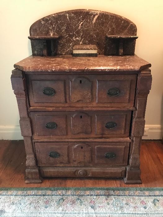 Small marble top dresser