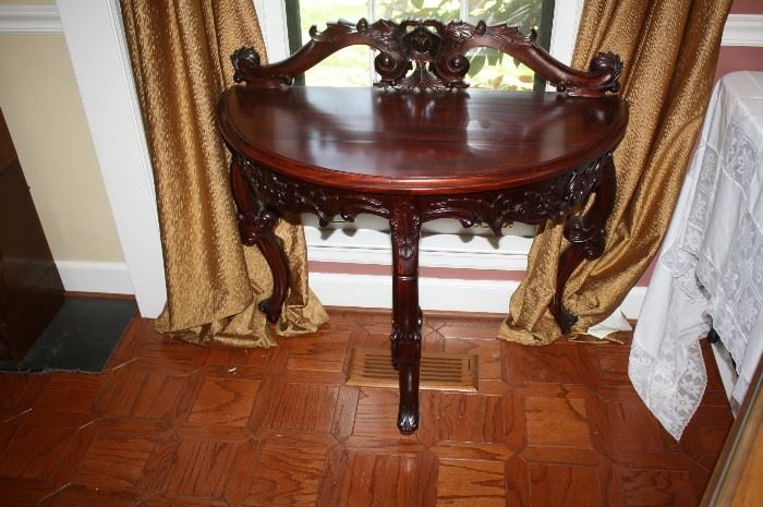 Hand carved  demi lune table