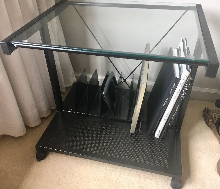 Side table with glass top on wheels