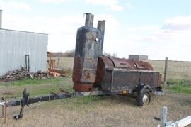 Bar-B-Q pit with smoker on wheels