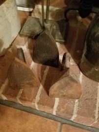Three antique metal irons