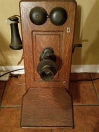 Antique phone that hung on our wall for years with working parts.