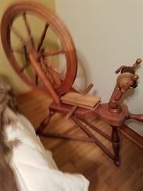 Mom's spinning wheel and wool combs.