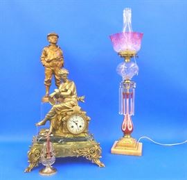 Cranberry banquet lamp, French clock, Spelter figure