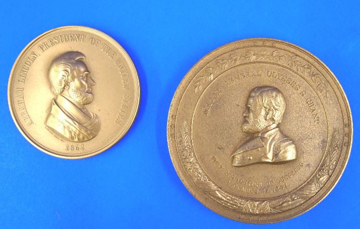 Bronze medallions of Lincoln and Grant