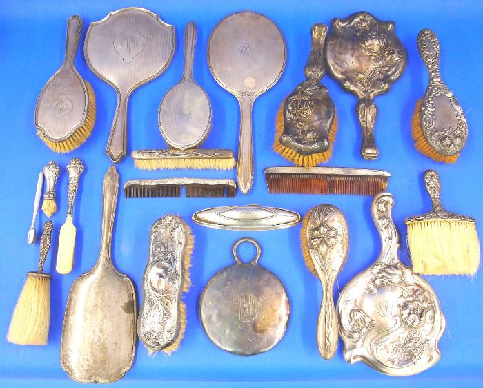 Sterling hand mirrors, brushes and combs