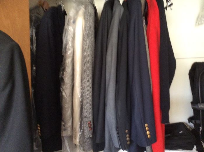 closets full of men's designer clothing sporting names like Ralph Loren, Ivan Piccone and more. Suits, shirts, pants and even a tuxedo. Mostly sizes 44R
