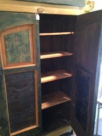 Primitive armoire provides great storage.