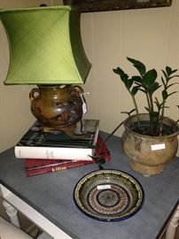 Green shade on small clay pot lamp