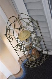 A number of folding metal plant stands