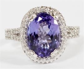5.9 CT TANZANITE AND DIAMONDS 14 KT GOLD RING