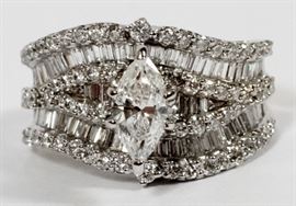 2.9 CT BAGUETTES AND ROUND DIAMONDS CENTER MARQUIS RING
