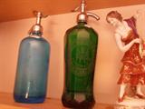AMAZING colored glass, etched logo seltzer bottles. Green ones is from DETROIT!